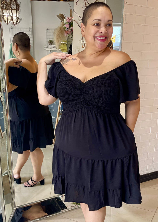 The Carrie Smocked Mini Dress - Black